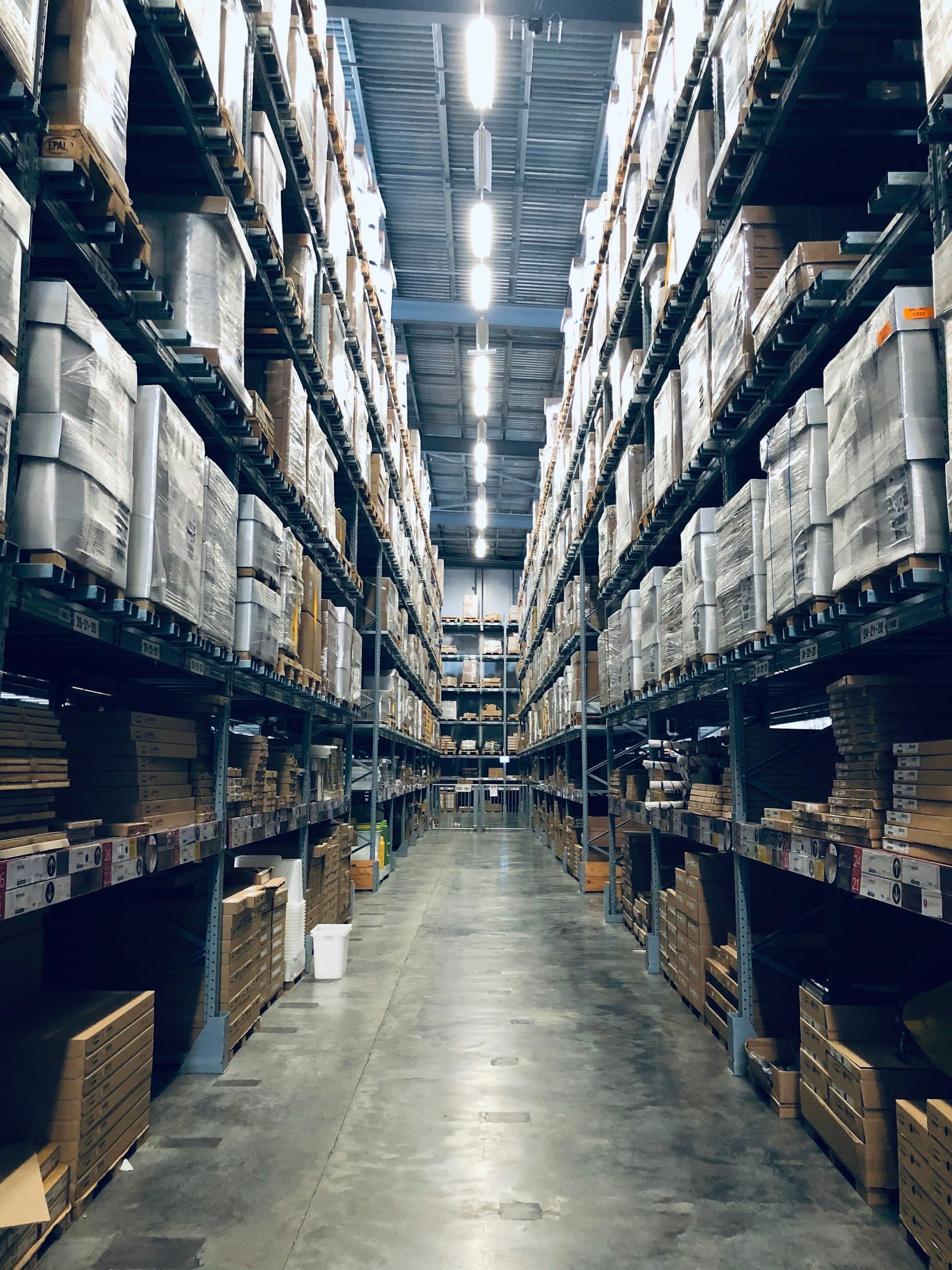 Warehouse aisle with stocked shelves